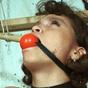 Thai gagged with clamps on tits