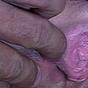 Sultry blonde sucks a finger while jerking off a thick cock