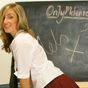 Melanie in mini skirt college uniform with black stockings