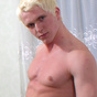 Blond twink Andrey shows off his cock