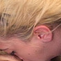 A bleached blonde bimbo sucking cock and being assfucked