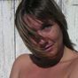 My wife topless on holliday