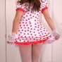 Kara in a polkadot dress with white socks and stockings