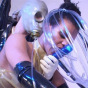 Lesbians in rubber outfits and gas mask dildo their slave