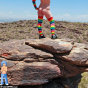 Young rainbow raver naked in the desert