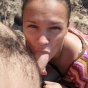 Ponytailed brunette young wife Dasha sucking Max's big penis on the beach