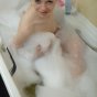 Adorable blonde teenage cutie Elise washing her skinny body in bathroom