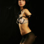 Sultry babe with lustrious black hair and hypnotic eyes.