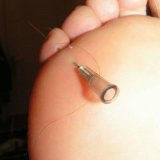 Extreme needle playing on nipples and feet
