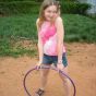 Uninhibited petite teen Kitty Kim playing hoola hoop outdoors