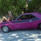 Jana Rocks: Blonde teen Jana poses in a skimpy black bikini ontop of a muscle car