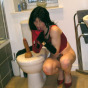 Dirty crossdresser Kirsty riding a big cock toy on the toilet seat