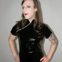 Crossdresser wearing slutty black pvc dress gets a very red ass from a hard spanking