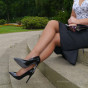 Sexy Karen raises a few shoe fetish desires as she poses outdoors in a lovely pair of silky nylons accompanied by a tall shiny pair of black high heeled stilettos