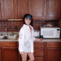 SpunkyAngels: Sexy minx Sabrina teases in the kitchen wearing nothing but her dad's dress shirt