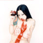 tattooed vampire girl covers herself in blood