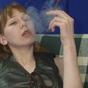 Smoking stocking babe smoking and playing clit