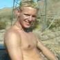 Gorgeous twink in jeans masturbates in desert