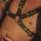 Gay hunk in BDSM suit gets heavy ass reaming plays