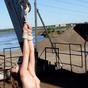 Hot naked brunette bound hand and foot on board a ship