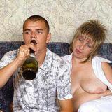 A mature lady in white seduces a drunken youngster