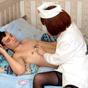 A mature nurse in black stockings performs blowjob