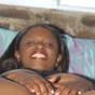 Ebony wife squeezes her nips